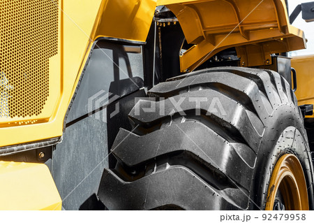 rubber wheels of a tractor, grader, bulldozer or construction equipment. rubber wheels of a tractor, grader, bulldozer or construction equipment. 92479958