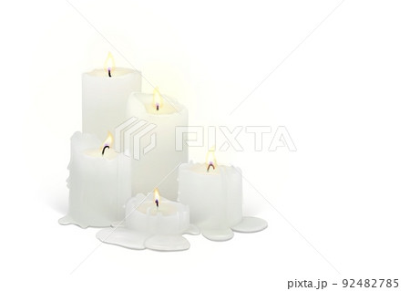 Set of realistic burning candles on a white background Set of realistic burning candles on a white background 92482785