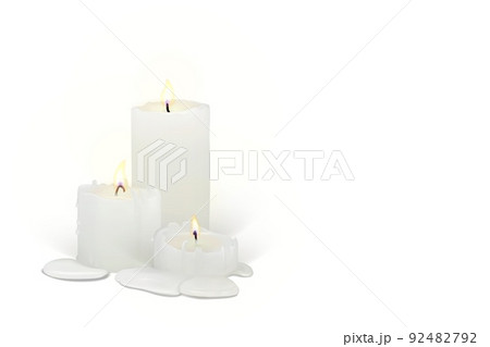 Set of realistic burning candles on a white background 92482792