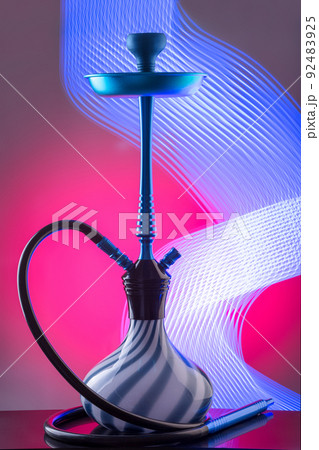 Blue eastern hookah on colorful background Blue eastern hookah on colorful background 92483925