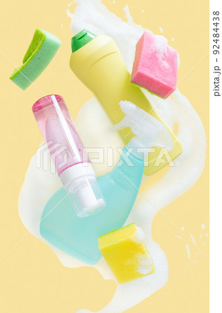 Cleaning concept - velitation of cleaning supplies on pastel background Cleaning concept - velitation of cleaning supplies on pastel background 92484438