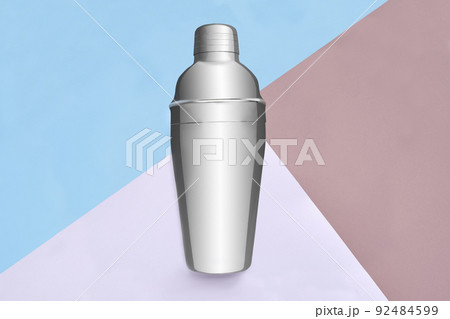 Cocktail shaker on a multicolored background 92484599
