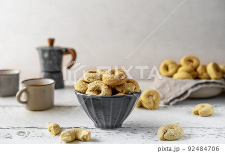 Sweet Italian cookies Taralli made with white wine, sugar, olive oil, eggs and flour Sweet Italian cookies Taralli made with white wine, sugar, olive oil, eggs and flour 92484706