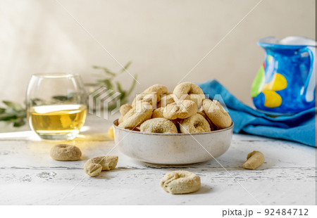 Sweet Italian cookies Taralli made with white wine, sugar, olive oil, eggs and flour Sweet Italian cookies Taralli made with white wine, sugar, olive oil, eggs and flour 92484712
