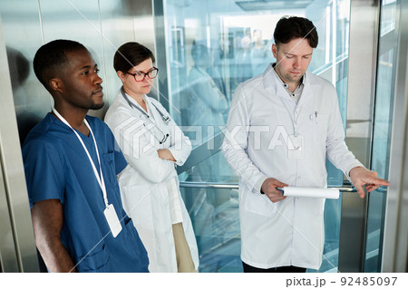 Group of Doctors in Elevator Group of Doctors in Elevator 92485097