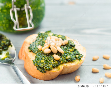 baguette bread with fresh pesto baguette bread with fresh pesto 92487107