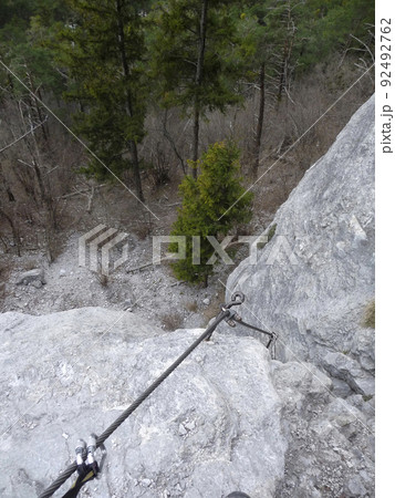 Via ferrata at Martinswand mountain, Kaiser Max rise, Tyrol, Austria Via ferrata at Martinswand mountain, Kaiser Max rise, Tyrol, Austria 92492762