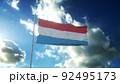 Flag of Luxembourg waving at wind against beautiful blue sky. 3d illustration 92495173