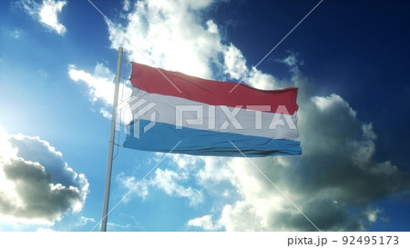 Flag of Luxembourg waving at wind against beautiful blue sky. 3d illustration 92495173
