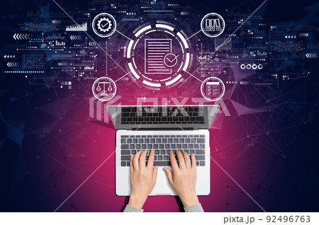 Compliance theme with person using laptop 92496763