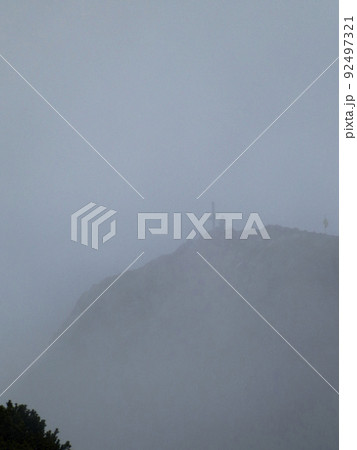 Summit cross Naunspitze mountain in Tyrol, Austria 92497321