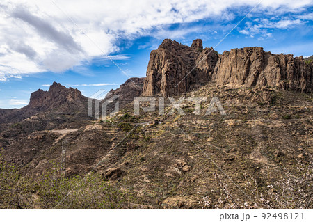 View at Roque Nublo mountain at Gran Canaria in Spain. Beautiful natural panorama. View at Roque Nublo mountain at Gran Canaria in Spain. Beautiful natural panorama. 92498121