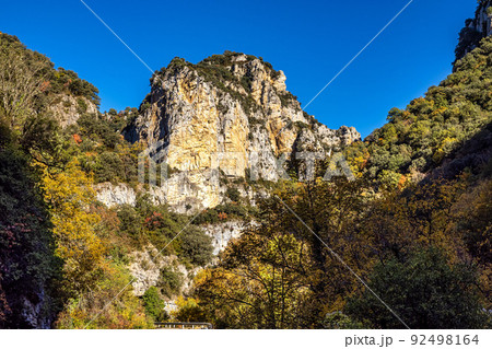 Driving through Foz de Arbayun canyon of Salazar River in the Pyrenees in Spain 92498164