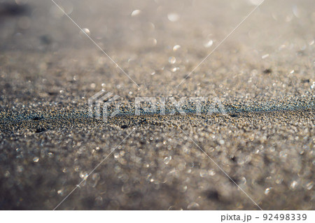 Black sand on the beach Bali, Indonesia 92498339