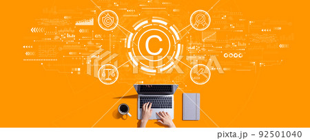 Copyright concept with person working with laptop 92501040