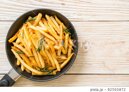 French fries with sour cream and ketchup 92503872