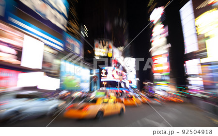 Yellow Taxi in Manhattan, New York City  in USA with blur technique 92504918