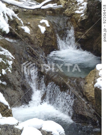 Waterfall at winter mountain tour to Seekarkreuz mountain, Bavaria, Germany Waterfall at winter mountain tour to Seekarkreuz mountain, Bavaria, Germany 92506458