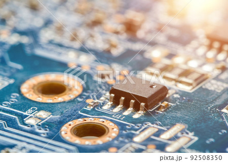 Close-up of computer chip on a Computer graphics card with sunlight Close-up of computer chip on a Computer graphics card with sunlight 92508350