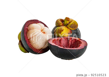 View of whole and half mangosteen isolated on white background. View of whole and half mangosteen isolated on white background. 92510523