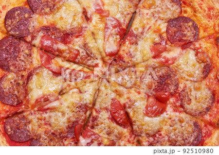 Pepperoni Pizza top view close-up macro shot 92510980