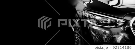 banner. car headlight on a black background. dealer center. 92514186
