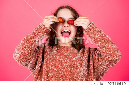 Healthy breakfast. Vitamin concept. Juicy berry. Summer berries. Child eating strawberry. Happy child. Sucrose fructose glucose. Girl eating fresh natural strawberry. Healthy food. Health care Healthy breakfast. Vitamin concept. Juicy berry. Summer berries. Child eating strawberry. Happy child. Sucrose fructose glucose. Girl eating fresh natural strawberry. Healthy food. Health care 92516619