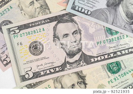 5, 20, 50, 100 dollars banknotes at different angles. Close up of dollars on white background. 5, 20, 50, 100 dollars banknotes at different angles. Close up of dollars on white background. 92521935