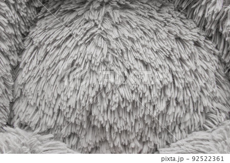 Puffy fabric texture soft toy gray light color abstract material pattern textile close-up background Puffy fabric texture soft toy gray light color abstract material pattern textile close-up background 92522361