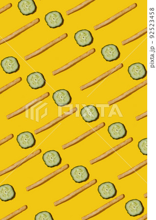 Heap of french fries on yellow background, top view Heap of french fries on yellow background, top view 92523458