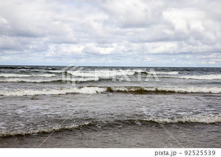 Cold summer season on the Baltic Sea in windy weather Cold summer season on the Baltic Sea in windy weather 92525539