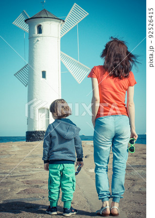 Mom and her son on west breakwater in Swinoujscie Mom and her son on west breakwater in Swinoujscie 92526415