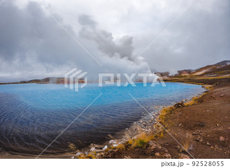 Blue lake panorama near geothermal power plants 92528055