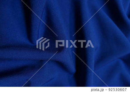 Blue galliano fabric crumpled or wavy fabric texture background. Abstract linen cloth soft waves. Viscose yarn. Smooth elegant luxury cloth texture. Concept for banner or advertisement. 92530607