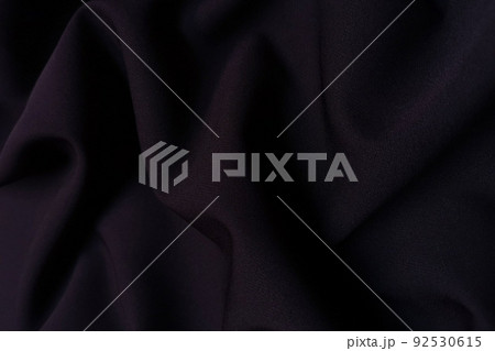 Violet crumpled or wavy fabric texture background. Abstract linen cloth soft waves. Silk atlas or stretch jacquard. Smooth elegant luxury cloth texture. Concept for banner or advertisement. Violet crumpled or wavy fabric texture background. Abstract linen cloth soft waves. Silk atlas or stretch jacquard. Smooth elegant luxury cloth texture. Concept for banner or advertisement. 92530615