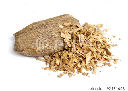 Agarwood, aloeswood, eaglewood or gharuwood. Piece of wood and shavings. Isolated. Agarwood, aloeswood, eaglewood or gharuwood. Piece of wood and shavings. Isolated. 92531008