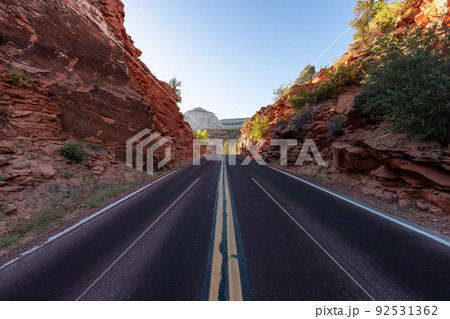 Scenic Road in American Mountain Landscape. Sunny Morning Sunrise Scenic Road in American Mountain Landscape. Sunny Morning Sunrise 92531362