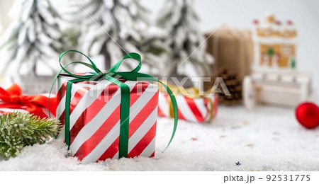 Christmas banner with gift boxes and Christmas decorations on a white background, copy space 92531775