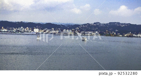 2 ferries between Kagoshima city and the volcano Sakurajima, in Kinko Bay, in pointillism style. 2 ferries between Kagoshima city and the volcano Sakurajima, in Kinko Bay, in pointillism style. 92532280