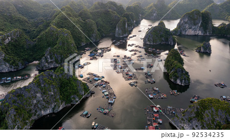 Floating fishing village and rock island in " Lan Ha " Bay, Vietnam, Southeast Asia 92534235