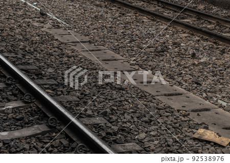 Railroad crossing through in railway station. 92538976