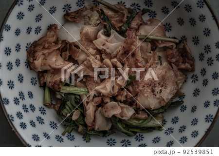 Stir fried flat noodle and Chicken with dark soy sauce and vegetables (Thai people called Pad See Ew), It is one of the most popular street food in the world. Stir fried flat noodle and Chicken with dark soy sauce and vegetables (Thai people called Pad See Ew), It is one of the most popular street food in the world. 92539851
