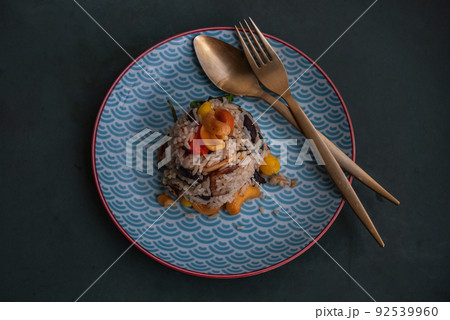 Mixed vegetarian,carrot, Ginkgo, Jujube, Peas and Taro fried rice in a japanese plate. Mixed vegetarian,carrot, Ginkgo, Jujube, Peas and Taro fried rice in a japanese plate. 92539960