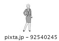 スーツを着てカッコよくポージングする女性 92540245