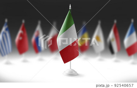 The national flag of the Italy on the background of flags of other countries The national flag of the Italy on the background of flags of other countries 92540657