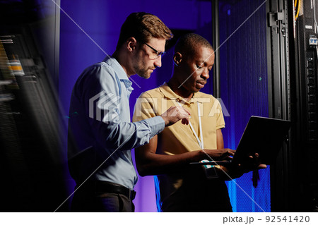 Network Technicians Using Laptop Network Technicians Using Laptop 92541420