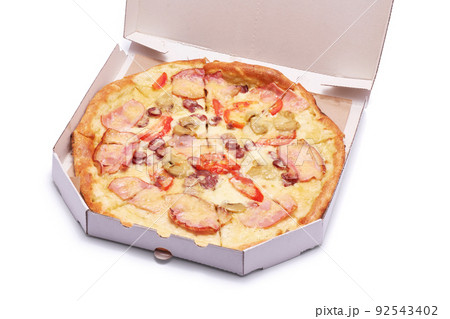Pizza in a cardboard box isolated on white background Pizza in a cardboard box isolated on white background 92543402