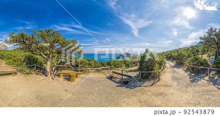 Beautiful seascape, panorama of cape Kapchik to the Galitsin Trail and blue bay of the Black Sea. Sudak, New World. Landscape of the sea coast. The concept of calmness, silence and unity with nature. Beautiful seascape, panorama of cape Kapchik to the Galitsin Trail and blue bay of the Black Sea. Sudak, New World. Landscape of the sea coast. The concept of calmness, silence and unity with nature. 92543879