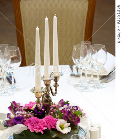 Candles with flowers Candles with flowers 92551366
