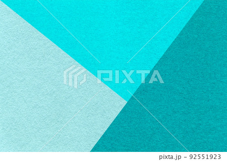 Texture of craft cyan, turquoise and blue shade color paper background, macro. Vintage abstract cerulean cardboard 92551923